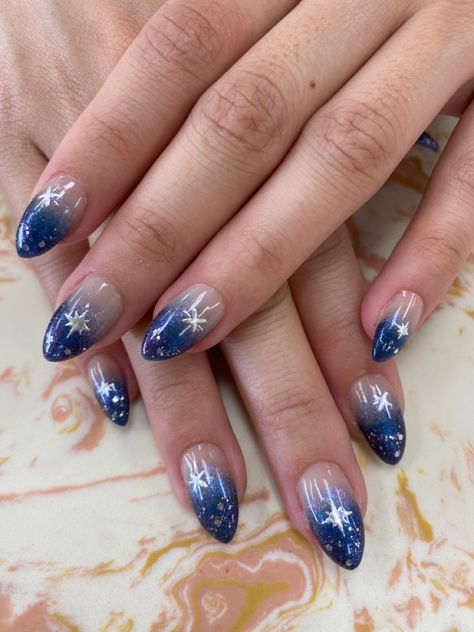 Under The Stars Nail Design, Yule Ball Nails, Dark Blue Starry Nails, Night Under The Stars Nails, Navy Quince Nails, Dark Blue Glittery Nails, Prom Nails Dark Blue And Silver, Blue Christmas Nails Designs, Night Themed Nails