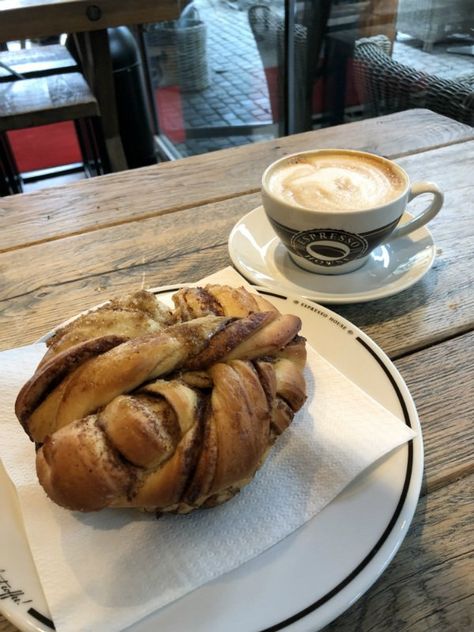 Coffee and a cinnamon bun from Espresso house in Oslo, Norway Espresso House, Cinnamon Bun, Oslo Norway Food, Living In Norway Aesthetic, Stockholm Coffee Shop, Oslo Coffee Shop, Norway Coffee Shop, Europe Coffee Aesthetic, Small Coffee Shop