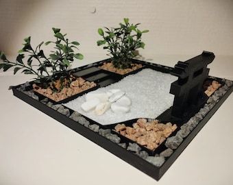 Immerse yourself in the timeless tranquility of a Japanese Zen Garden, meticulously crafted to bring peace into your life wherever you are. Our Handcrafted Zen Garden Kit is not merely a product; it is your gateway to serenity, an invitation to embark on a journey of meditation and relaxation. Jardin Zen Miniature, Tabletop Zen Garden, Desktop Zen Garden, Miniature Zen Garden, Japanese Zen Garden, Japanese Zen, Garden Planter, Garden Kits, Desk Toys