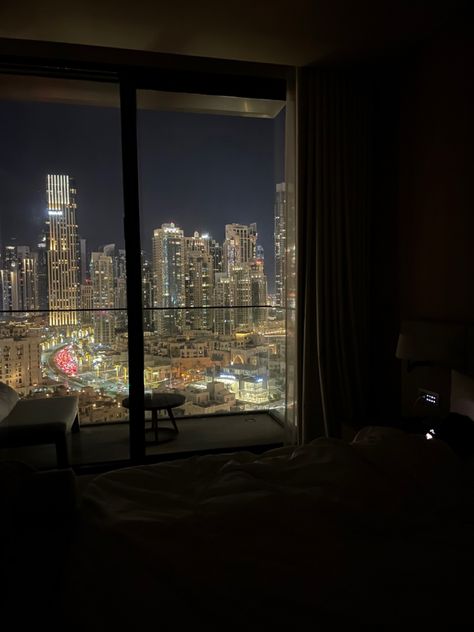 amazing view of dubai at night from hotel room Sky Scrapers At Night, Dubai Room View, Dubai Night View, Dubai Hotel Room, Rooms Wallpaper, Nice Bedrooms, Dubai Night, Hotel View, Bed Picture