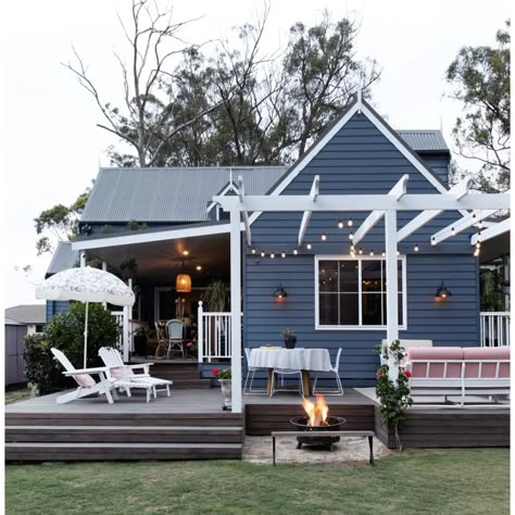 Blue House With Pergola, Navy Weatherboard House, Small Cottage Paint Exterior, Navy Cottage Exterior, Front Porch Blue House, Dark Blue House With Deck, Navy Blue Beach House Exterior, Nautical House Exterior, Blue House With Porch