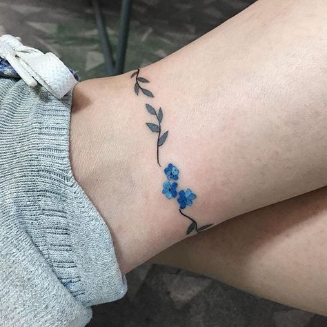 Discover | Tattoodo Ankle Bracelets Tattoos For Women, Tattoos Pulseras, Bracelet Tattoos For Women, Wrap Around Ankle Tattoos, Wildflowers Tattoo, Ankle Bracelet Tattoo, Ankle Tattoo Designs, Armband Tattoos, Ankle Tattoos For Women