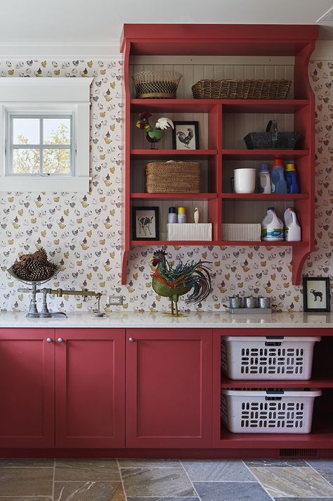 laundry room with red cabinets and built in storage for laundry baskets Orange Laundry Room, Red Laundry Room, Red Cabinets, Red Farmhouse, Laundry Design, Farmhouse Laundry, Farmhouse Laundry Room, Laundry Baskets, Professional Decor