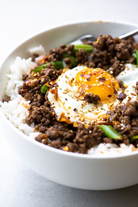 Easy Korean Beef Rice Bowls in 30 minutes, who wouldn't want this for dinner?  It's full of spicy, umami flavor, but omit the heat and kids will devour it. #easy #recipe #Asian #korean #beef #groundbeef #rice #ricebowl #dinner #kids Ground Beef Rice Bowl, Beef Rice Bowl Recipe, Beef Rice Bowls, Easy Korean Beef, Beef Bowl Recipe, Dinner Kids, Rice Bowl Recipe, Korean Beef Bowl, Ground Beef Rice