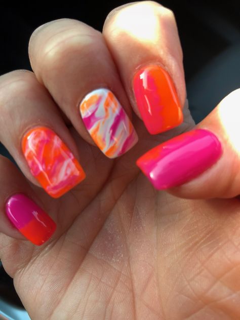 Pink White And Orange Nails, Pink And Coral Nails Summer, Pink Orange And Purple Nails, Coral Marble Nails, Pinky Orange Nails, Pink Orange And Yellow Nails, Neon Orange And Pink Nails, Pink And Orange Nail Art, Hot Pink And Orange Nails