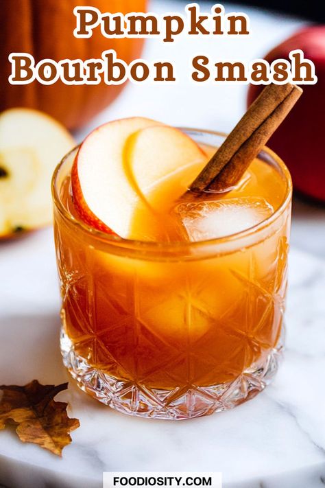 Enjoy the rich, bold flavors of fall with the Pumpkin Bourbon Smash Cocktail! This deliciously spiced drink is perfect for cozy gatherings and autumn celebrations. Click to get the recipe and indulge in this seasonal favorite! Autumn Whiskey Cocktail, Whiskey Fall Drinks, Fall Bourbon Drinks, Burbon Drinks, Fall Bourbon Cocktails, Jameson Whiskey Drinks, Fall Whiskey Cocktails, Bourbon Smash Cocktail, Festive Holiday Cocktails