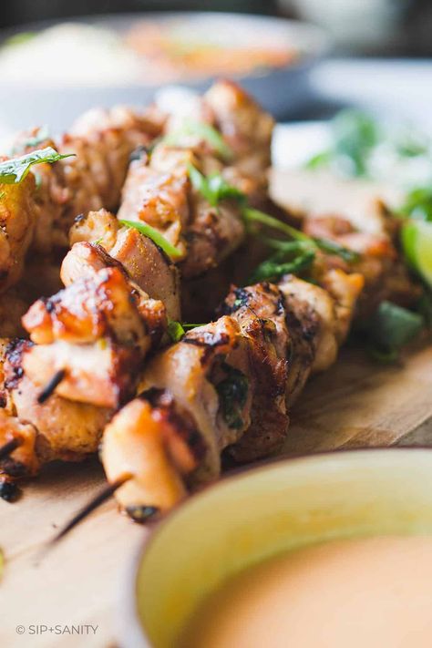 Fire up your grill and get ready for mouthwateringly delicious Coconut Curry Marinated Grilled Chicken Skewers! It's a quick and easy recipe bursting with Thai-inspired flavors. The star of this recipe lies in the marinade, where creamy coconut milk mingles with an array of umami-laden flavors to tenderize the meat and ensure every bit is bursting with goodness. The grill works its magic to sear in the flavor and add a smoky dimension, resulting in juicy, tasty chicken. Thai Coconut Chicken, Thai Coconut Curry, Grilled Chicken Skewers, Shish Kabobs, Tasty Chicken, Thai Coconut, Chicken Skewers, Coconut Curry, Kebabs