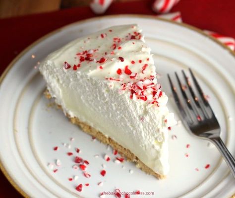 Holiday White Chocolate Peppermint Cheesecake Mousse Pie White Chocolate Peppermint Cheesecake, Chocolate Peppermint Cheesecake, Holiday Pies Recipes, Mousse Pie, White Chocolate Peppermint, Peppermint Cheesecake, Peppermint Cream, Christmas Pie, Cream Cheese Desserts