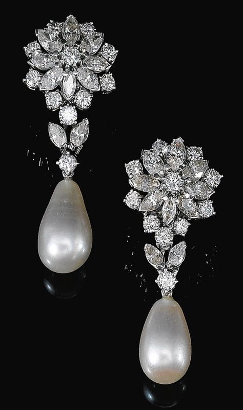 FINE PAIR OF NATURAL PEARL AND DIAMOND EARRINGS, 1960S. Of floral design, each surmount set with marquise-shaped and brilliant-cut diamonds, suspending a drop-shaped natural pearl measuring approximately 10.4 x 10.5 x 17.4mm and 9.75 x 10.0 x 15.8mm respectively, butterfly and post fittings. Pearl And Diamond Earrings, Natural Pearl, Fabulous Jewelry, Gorgeous Jewelry, Natural Pearls, Diamond Earrings Studs, Modern Jewelry, Chandelier Earrings, Diamond Pendant