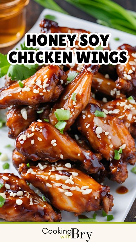 These Honey Soy Chicken Wings are the ultimate crowd-pleaser! Marinated in a sweet and savoury honey soy sauce, these wings are baked to perfection, delivering tender meat with a sticky, caramelised coating. Perfect for game day, parties, or as a delicious snack, these wings are sure to be a hit with family and friends. Easy to prepare and full of flavour, they are a must-try for any chicken wing lover. Serve with a sprinkle of sesame seeds and fresh spring onions. Honey Soy Sauce Chicken, Soy Chicken Wings, Soy Sauce Chicken Wings, Honey Soy Chicken Wings, Honey Wings, Recipes With Soy Sauce, Honey Soy Chicken, Soy Sauce Chicken, Baked Wings