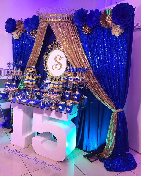 Creations by Martha🌸 on Instagram: “Stacy XV #setupbycreationsbymartha  #backdrop #paperflowers #paperflowerbackdrop  #quinceanera @creationsbymartha #creationsbymartha…” Royal Blue Quince Theme, Royal Blue And Gold Quinceanera, Off The Shoulder Quinceanera Dress, 15 Party Ideas Quinceanera, Royal Blue Quince, Black And Gold Party Decorations, Black And Gold Party, Royal Blue Quinceanera, Quince Decor