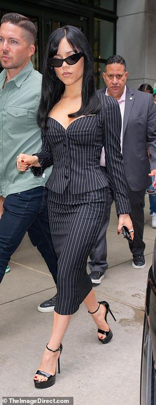 Jenna Ortega turns heads in a pinstripe skirt suit with Beetlejuice 2 costars Catherine O'Hara, Winona Ryder and Monica Bellucci in NYC | Daily Mail Online Pinstripe Skirt Suit, Beetlejuice 2, Shoulder Length Blonde, Lauren Sanchez, Pinstripe Skirt, Y2k Icons, Black Overcoat, Gold Blazer, Black Leather Blazer