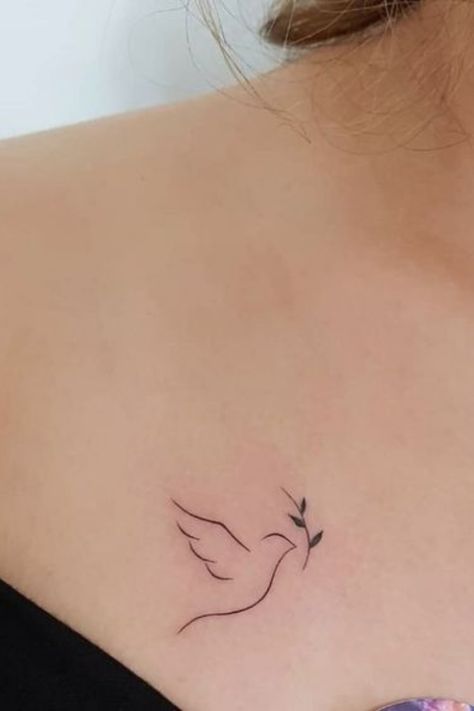 Elegant dove tattoo design with delicate shading for a peaceful and symbolic body art piece Tattoos That Symbolize Freedom, Holy Spirit Dove Tattoo, Tattoos For Peace, Fine Line Dove Tattoo, Dove With Olive Branch Tattoo, Freedom Tattoo Ideas, Peace Tattoos For Women, Dove Neck Tattoo, Dove Tattoo Meaning