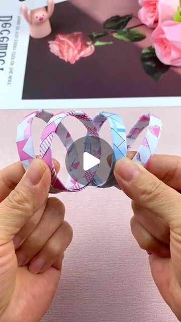 paper crafts creator on Instagram: "Title: "Bestie Bracelet: Handmade DIY for Friendship Fun!"
Hashtags: #HandmadeDIY #FriendshipBracelet #CraftingTutorial #QuickLearning #PaperFoldingTutorial" Friendship Bands Diy, Handmade Friendship Band, Friendship Bands, Friendship Band, Paper Bracelet, Paper Folding Crafts, Girly Art Illustrations, April 6, Paper Folding