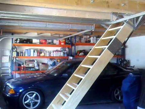 Gas Spring assisted retracting staircase for loft / attic access in my garage. No need for motorised system or electrics. Quick and easy to use and is light to pull down and push up. After an initial push, it retracts up under it's own power. Solid wood staircase construction with stainless steel hinge mechanism. Very strong and sturdy with quie... Attic Stairs Diy, Wood Attic, Retractable Stairs, Addition Project, Clamp Rack, Garage Stairs, Garage Organizing, Garage Organizer, Loft Staircase