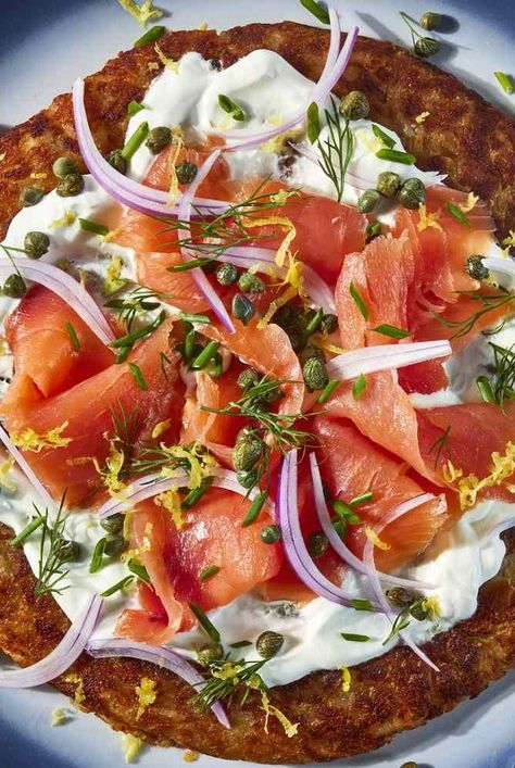 This potato rosti recipe is a shredded potato pancake cooked until golden then topped with smoked salmon and dill.