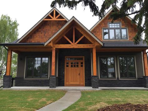 Craftsman Barn House, Dark Stained House Exterior, Medium Size Homes Exterior, Modern Rustic Kitchen Cabinets Hickory, Dark Blue House Exterior With Wood Craftsman, Black And Cedar House Exterior, Rustic Exterior House Colors, Linwood Homes, Rural Property