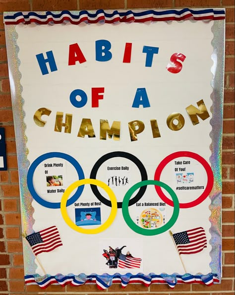 Olympics Board Ideas, Olympic Board Ideas, Olympic Office Decorations, Olympic Theme Door Decorations, Olympic Themed Back To School, Champion Bulletin Board Ideas, Olympic Door Decorations, Summer Olympics Bulletin Board Ideas, Olympic Classroom Ideas