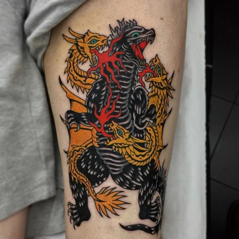 Godzilla having a ruckus with his old mate King Ghidorah on the back of Jacks huge thigh. lukejinks@gmail.com for bookings. Cheers! Godzilla Back Tattoo, Godzilla And Mothra Tattoo, Traditional Godzilla Tattoo, King Ghidorah Tattoo, Godzilla Tattoo Ideas, Ghidorah Tattoo, Kaiju Tattoo, Godzilla Tattoo Design, Traditional Tattoo Cover Up