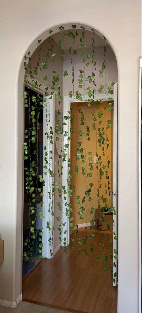 Vine Doorway, Vines On Bookshelf, Hanging Vines Bedroom, Flower Canopy Bed, Aesthetic Vines, Bedroom Board, Cottagecore Bedroom, Hanging Curtain Rods, Hang Curtains