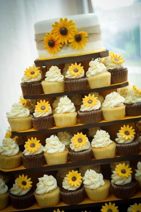 Like the idea of cupcakes...easier to serve. Make them two different colors instead of having the sunflowers on them. Wedding Cakes Sunflower, Cupcake Signs, Rustic Cupcakes, Sunflower Cupcakes, Sunflower Cake, Rustic Sunflower Wedding, Sunflower Party, Sunflower Themed Wedding, Sunflower Baby Showers