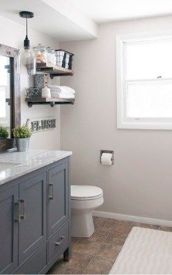 Agreeable Gray, the Ultimate Neutral Greige Paint Color | The Flooring Girl Industrial Farmhouse Bathroom, Farmhouse Bathroom Mirrors, Fixer Upper Bathroom, Industrial Style Bathroom, Farmhouse Bathroom Vanity, Agreeable Gray, Bathroom Farmhouse Style, Country Bathroom, Modern Farmhouse Bathroom