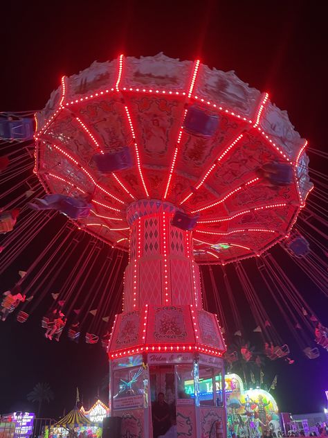 #fairy #carnival #neon #swing Red Carnival Aesthetic, Neon Circus Aesthetic, Fairy Carnival, Carnival Core, Spooky Carnival, Neon Circus, Amusment Parks, Fantasy Country, Carnival Aesthetic