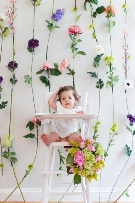 Beautiful boho wildflower decorations for a first birthday party #wildflowerbirthdaypartyideas #bohobirthdaypartyideas #bohopartydecor #wildflowerpartydecor  #kidsbirthdayparty #kidsbirthdaypartyideas #girlbirthdayparty #girlbirthdaypartyideas Lily First Birthday, One Year Old Flower Party, Floral Cake Smash Photography, Wild One Birthday Party Flowers, Wild Flower Theme Birthday Party, Wild Flowers Birthday Theme, Wild Flower One Birthday Party, Born To Bloom First Birthday, Wild Flower Party Theme