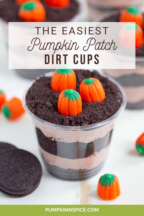 These easy Pumpkin Patch Dirt Cups are a fun dessert that's perfect for the season. Layers of chocolate pudding and crushed Oreos are topped with pumpkin candies that make the best fall sweet treat! Pumpkin Patch Dessert Cups, Fall Dirt Cups, Pumpkin Patch Pudding Cups, Fall Pudding Cups, Pumpkin Dirt Cups, Pumpkin Patch Dessert, Thanksgiving Dirt Cups, Pumpkin Pudding Cups, Pumpkin Patch Dirt Cups