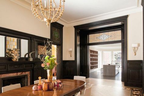 dark stained wood trim (looks black but is dark brown) in dining room. crown molding is still white Dark Stained Wood Trim, Stained Wood Trim, Black Wainscoting, Dark Wood Trim, Painted Wainscoting, Wainscoting Bedroom, Dining Room Victorian, Dining Room Wainscoting, Wainscoting Styles