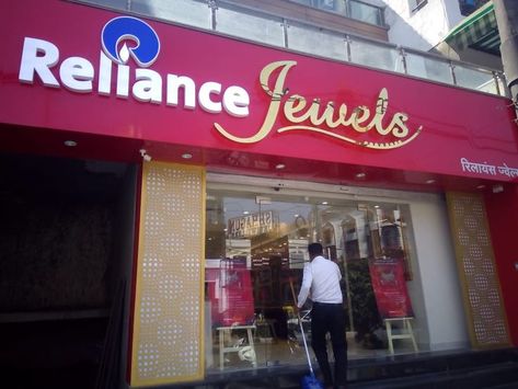 Project- Reliance Jewels Location- Paschim Vihar, DELHI Scope of Work- Turnkey Projects Interior Contractor- Singh Furncraft Pvt Ltd A glimpse of our work for Reliance Jewels, a 6500 sq. ft. The area was created using high-quality materials. #Pinterestindia #interiordesign #interiordecor #officedecor #architecturedesign #newdelhi #noida #designinterior #reliance #delhimall Reliance Jewels, Artificial Jewellery Shop Interior, Jewellery Shop Design Indian, Jewellery Shop Front Elevation Design, Jewelry Store Facade Design, Jewellery Showroom Elevation, Building Elevation, Office Decor, Interior Decorating