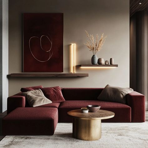 Luxurious deep red velvet lounge sectionals paired with organic wood textures and metallic lighting – bold 2025 statement living room pieces. Vintage luxury lounge sofa setup design for living spaces.