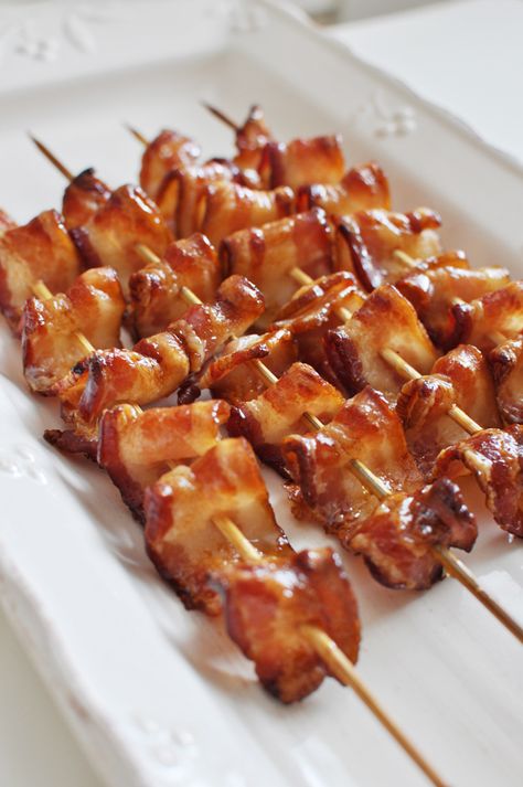 BACON KABOBS 2 pieces of folded bacon (folded like a fan) and then skewered on wooden skewers. Place on a wired rack in a cold oven. Turn oven onto 400 and back for 20 minutes or until desired doneness. Remove and while bacon is still warm, brush on maple syrup. Bacon Skewers, Wooden Skewers, Breakfast Party, Maple Bacon, Birthday Brunch, Bacon Recipes, Brunch Party, Breakfast Brunch Recipes, Breakfast In Bed