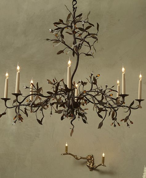 Eight Branch Wrought Iron and Glass Chandelier. Continuing the exploration of their love of trees the Olive chandelier was created after a single stem found it’s way into the sketch book. Wishing the branches to be a loose tangle of metal and glass, the accents of glass are a gentle implication of fruit and bring the foliage to life. Witchy Chandelier, Acorn Chandelier, Branches Chandelier, Large Olive Tree, Whimsical Interior, Wrought Iron Light Fixtures, Twig Chandelier, Tree Chandelier, Regal Decor