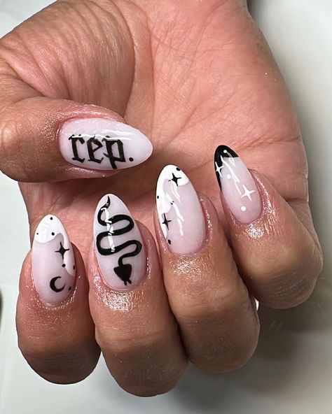 Monochrome hues, snakes and the iconic Rep lettering is all you need for Eras Tour claws to match your attitude. Nails To Match All Outfits, Rep Era Taylor Swift Nails, Rep Era Nails, Taylor Swift Nails Rep, Reputation Taylor Nails, Reputation Themed Nails, Taylor Reputation Nails, Taylor Swift Aesthetic Nails, Eras Tour Nails Reputation