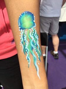 Arm Art - Happy Faces Party Dolphin Face Paint, Mermaid Face Paint, Easy Face Painting Designs, Sea Unicorn, Cool Face Paint, Festival Face Paint, Cheek Art, Internet Fame, Face Awards