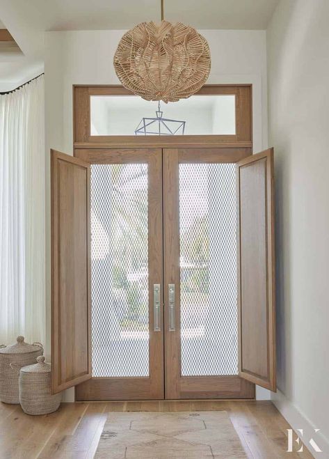 A Florida house gets beautifully renovated into a coastal contemporary retreat Beach House Front Door, St Armands Circle, Wood Front Entry Doors, Interior Door Knobs, Leaded Glass Door, Coastal House, Southern Living Homes, Wood Front Doors, Coastal Contemporary