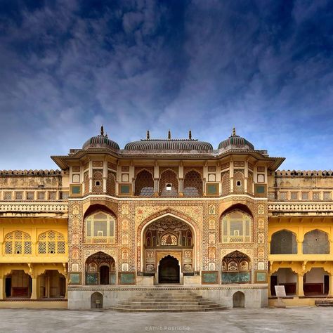 The Amer Fort (or Amber Fort) originally built by Raja Man Singh in 1592 AD, is said to have been named after Lord Ambikeshwar (Shiva), while the term ‘Amber’ also means ‘Amba’, Goddess Durga or protector of the fort. The structure of the Amer Fort is designed on the principles of Giri Durg (the hill fort) of the Vastu Shastra (Indian science of architecture), incorporating an excellent mix of Rajput and Mughal architectural styles of the then period. At present, Amer Fort is a UNESCO World Heri Amer Fort Jaipur, A Thousand Suns, Jaipur Travel, Devi Temple, Amber Fort, Double Door Entrance, Project Cover Page, Bodh Gaya, Amer Fort