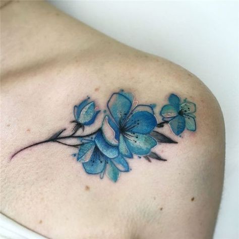 Blue cherry blossom tattoo on the shoulder | www.otziapp.com Blue Cherry Blossom Tattoo, Tattoo On The Shoulder, Colour Tattoo For Women, Watercolor Tattoo Ideas, His Tattoo, Daffodil Tattoo, Tulip Tattoo, Colour Tattoo, Flower Tattoo Ideas