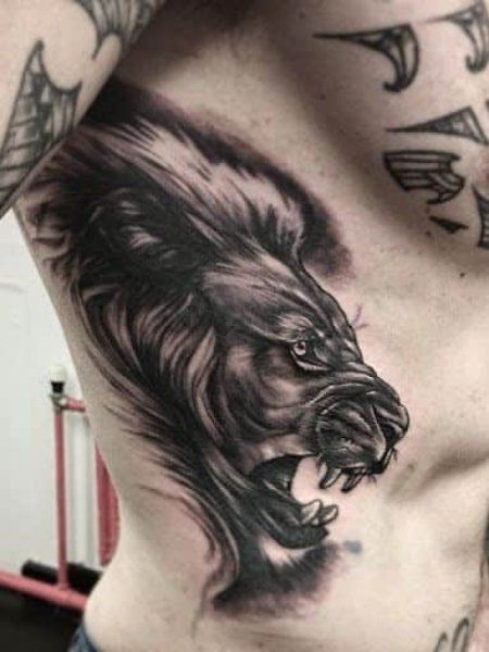 20 Cool Rib Tattoos for Men in 2021 - The Trend Spotter Cool Rib Tattoos, Mens Side Tattoos, The Best Tattoos For Men, Rib Tattoo Quotes, Flower Tattoo On Ribs, Rib Tattoos For Guys, Tattoos On Side Ribs, Best Tattoo Ideas For Men, Best Tattoos For Men