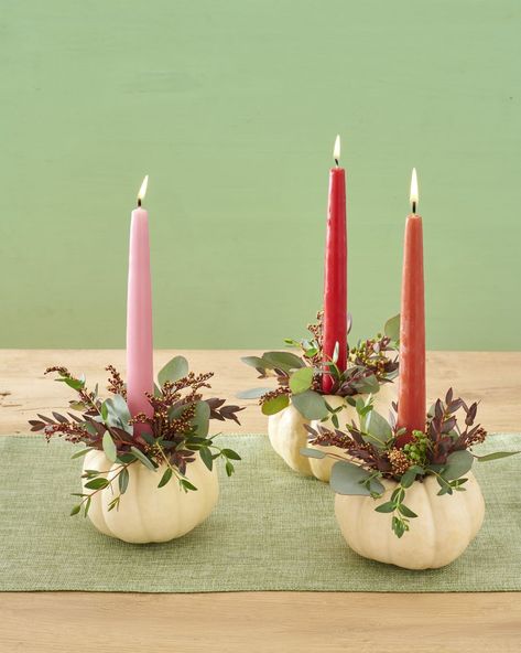 pumpkin candlesticks indoor halloween decorations Diy Halloween Luminaries, Pumpkin Candlesticks, Simple Floral Centerpieces, Diy Thanksgiving Decorations, Diy Thanksgiving Centerpieces, White Pumpkin Centerpieces, Thanksgiving Centerpieces Diy, Decoupage Pumpkins, Easy Diy Thanksgiving