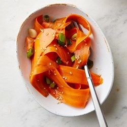 Sesame-Honey Carrot Ribbon Salad - EatingWell.com Swap out soy for liquid amigos and Yahtzee! Carrot Ribbon Salad, Asparagus Salad Recipe, Ribbon Salad, Honey Carrots, Vegetable Side Dishes Healthy, Vegetable Side Dishes Recipes, Spiralizer Recipes, Carrot Salad, Idee Pasto Sano