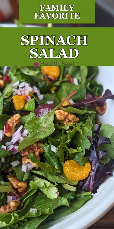 This delicious sweet spinach salad with poppyseed dressing is a family favorite! It has craisins or pomegrante seeds, mandarin oranges, red onion, and candied nuts! Perfect for a potluck or side dish. Orange Poppyseed Dressing, Spinach Poppyseed Salad, Salad With Mandarin Oranges, Salad With Poppyseed Dressing, Sweet Salad Dressings, Health Beet, Spinach Salads, Mandarin Salad, Orange Salad Recipes