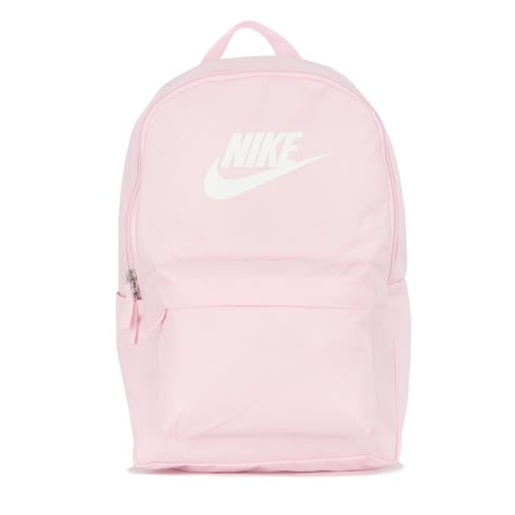 Take your gear to go with the Nike Heritage Backpack. Its spacious main compartment features a sleeve that holds up to a 15" laptop, so your computer is never out of reach. 2 zippered accessory pockets help keep your gear organized and easy to grab. This product is made with at least 65% recycled polyester fibers. Haul handle. Extra zipper compartments for organization. Densely woven polyester material is heavyweight. Padded shoulder straps and back panel for comfort. Internal laptop sleeve fits Backpack Pink Aesthetic, Cute Nike Backpacks, Cute Pink Backpacks For School, Backpacks To Get For School, Pink Nike Bookbag, Nike Backpack Pink, Nike Pink Backpack, Preppy Backpacks For Middle School, Pink Back Pack