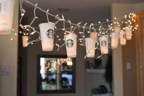 Starbucks Party Lights for all the coffee lovers out there. Created using Starbucks reusable cups and string lights for my beautiful daughter Gina, on her birthday. Photo by Gina Baker . Barista Birthday Party, Coffee Decorations Party, Coffee Birthday Party Ideas, Coffee Themed Party Birthday, Coffee Party Ideas Decoration, Starbucks Birthday Ideas, Coffee Birthday Theme, Coffee Themed Party Decorations, Starbucks Bday Party Ideas