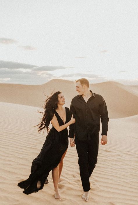 Sunset Sand Dunes Engagement Shoot Sand Dunes Photoshoot, Engagement Shoots Poses, Desert Engagement Photos, Desert Photoshoot, Great Sand Dunes National Park, Great Sand Dunes, Wedding Photoshoot Props, Sand Dunes National Park, Engagement Pictures Poses