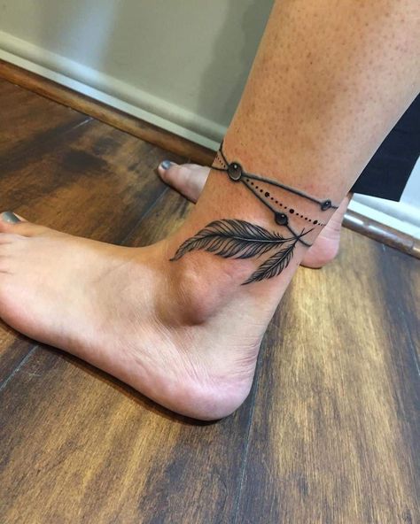 Ankle Feather Tattoo 1 A Feather Tattoo, Native American Feather Tattoo, Owl Feather Tattoos, Feather Tattoo Ankle, Phoenix Feather Tattoos, Eagle Feather Tattoos, Anklet Tattoos For Women, Small Feather Tattoo, Cuff Tattoo