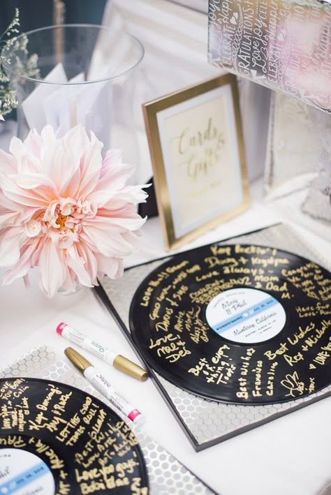 In honor of Record Store Day, we’re taking a look at some of the fun and creative ways couples have incorporated vinyl details into their wedding decor. Festa Rock Roll, Creative Wedding Guest Books, Ultimate Wedding Planning Checklist, Diy Guest Book, Wedding Guest Book Ideas, Music Themed Wedding, Wedding Guest Book Unique, Guest Book Ideas, Wedding Guest Books