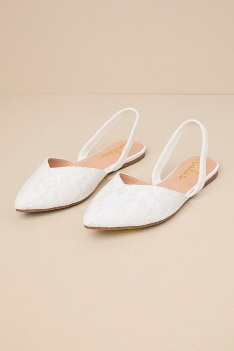 Step into style with the Lulus Mae White Lace Pointed-Toe Slingback Flats! These sweet cuties are the perfect blend of chic and sensible with their low-maintenance flat sole, comfortable elastic slingback strap, and cute notched pointed-toe upper composed of romantic floral lace. 0. 25" rubber heel. Lightly cushioned insole. Felted rubber sole has nonskid markings. Man made materials. Imported. Lulus | Mae White Lace Pointed-Toe Slingback Flats | Size 6.5. Comfortable Wedding Shoes For Bride Ballet Flats, Flat Wedding Shoes For Bride Boho, Bridal Shoes No Heel, Wedding Shoe Flats, White Bride Shoes, Wedding Flats For Bride Sandals, Flat Wedding Shoes For Bride, White Wedding Shoes Flats, Bride Shoes Flats