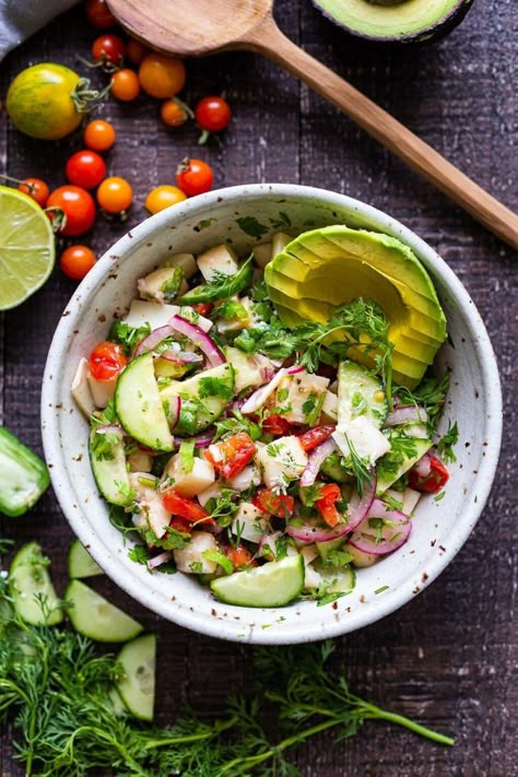 This vegan, plant-based Ceviche will transport you to Mexico. Made with hearts of palm and avocado, this easy recipe can be served on tostadas, with chips or in lettuce cups! #veganceviche #heartsofpalm #veganmexican #ceviche Vegan Hearts Of Palm, Hearts Of Palm Ceviche, Daniel Fasting, Vegan Ceviche, Ceviche Ingredients, Vegan Crab Cakes, Feasting At Home, Vegan Crab, Heart Of Palm